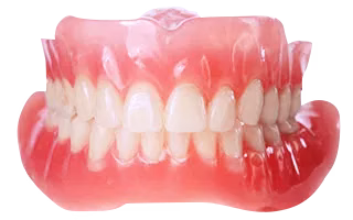 Full dentures showcasing natural-looking artificial teeth, demonstrating a solution for restoring smiles and functionality at Rosemary Dental Spa in Albuquerque.